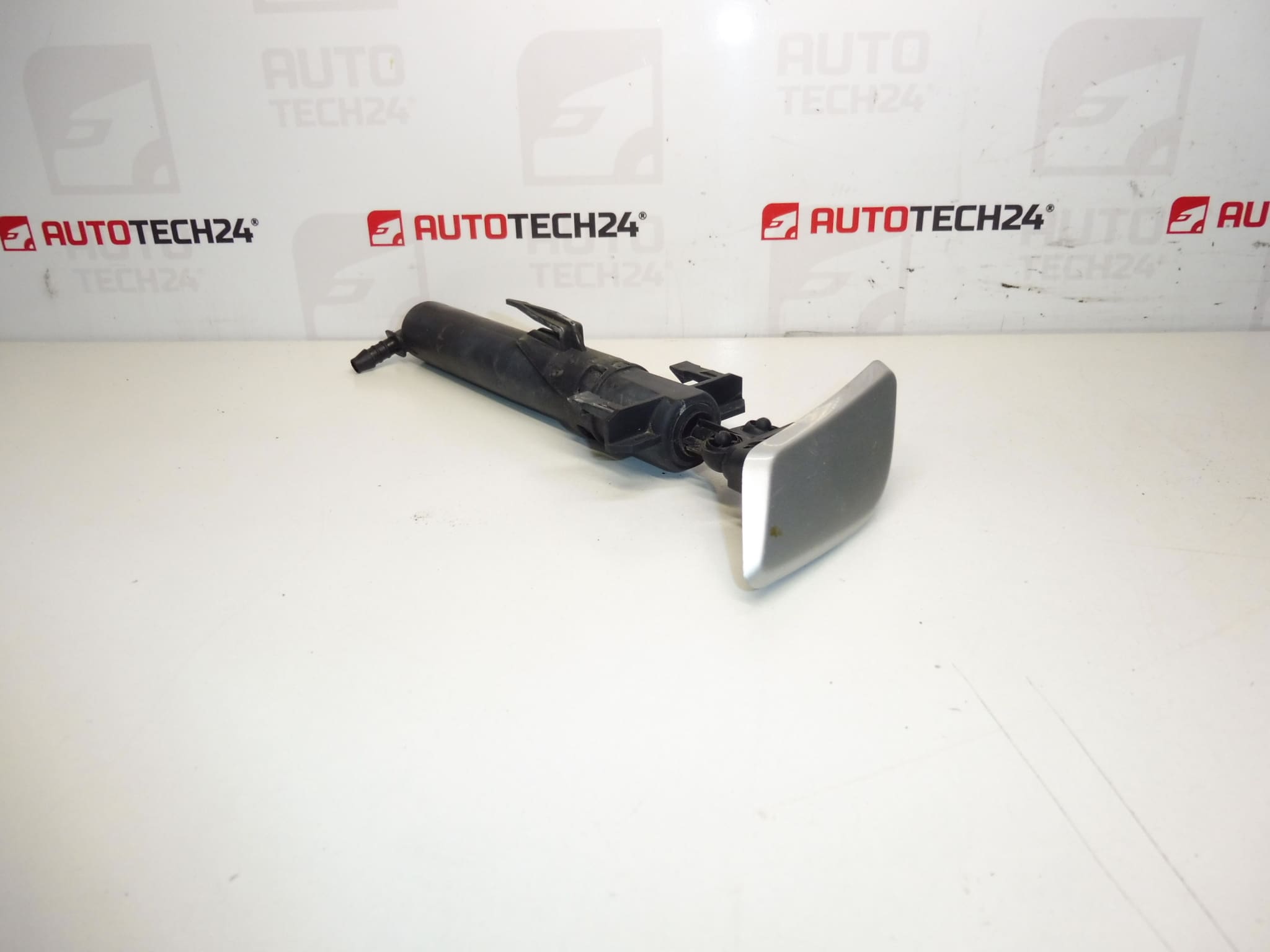 Left headlight washer nozzle Peugeot 307 II 6438P1 6438S5 6438T0